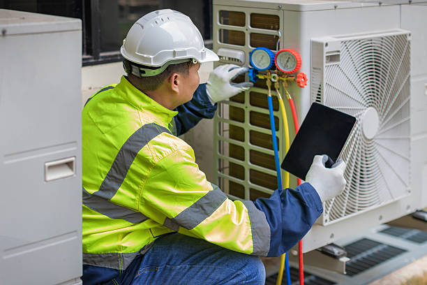 Professional Air Conditioning Repair technician working in Morton, IL